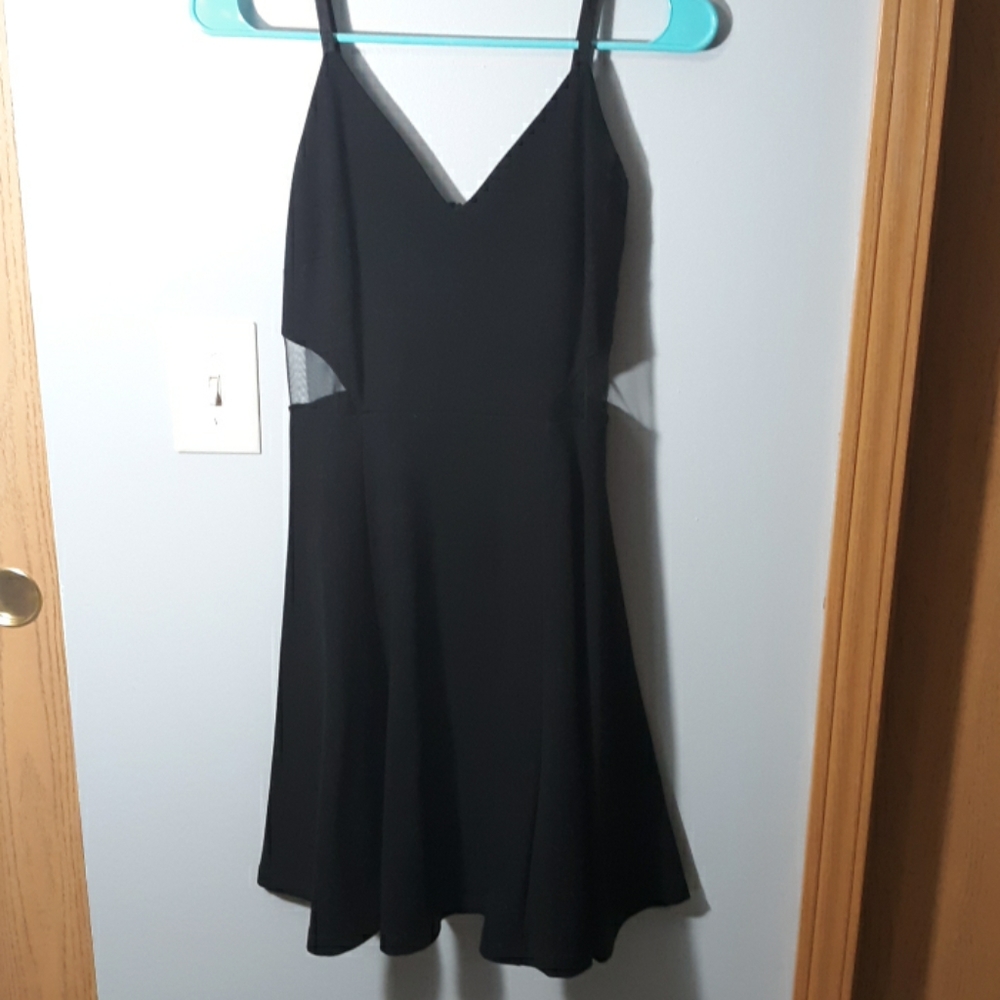 Black dress with black mesh cutouts